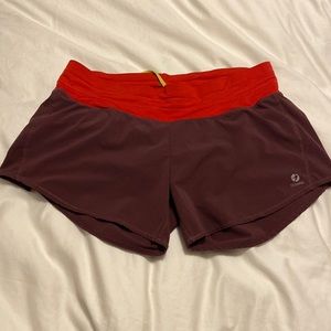 Oiselle Roga zip pocket lined shorts size 6